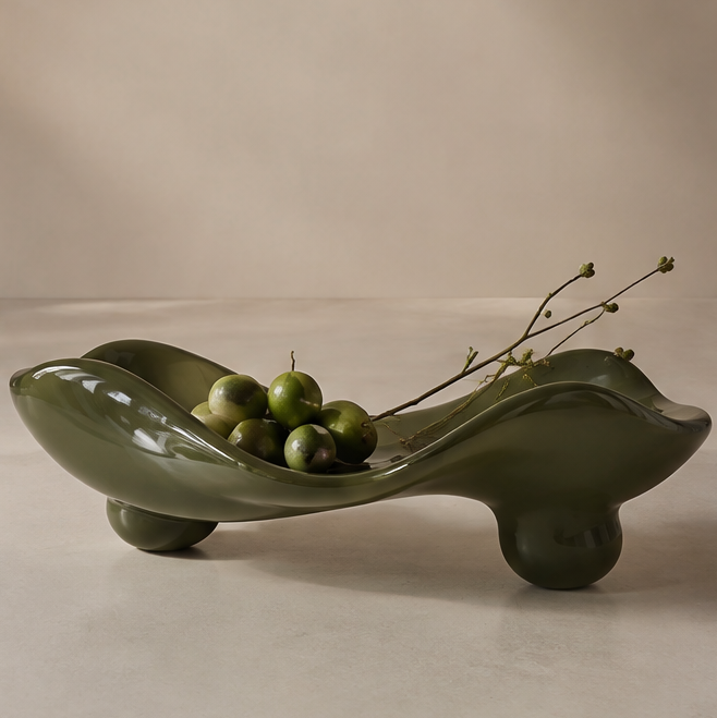 Olive green glazed organic tray with fruit — clean plain background