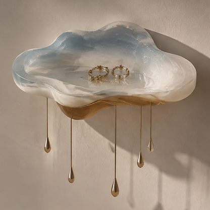 Blue marble resin cloud tray with gold raindrop legs and rings — clean background